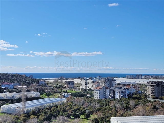 Просторная квартира 2+1 с видом на море в тихом районе Алании 