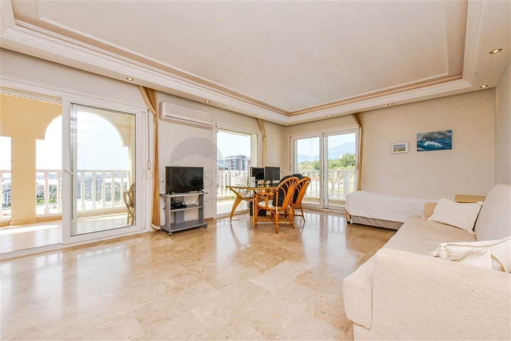 Просторная квартира 2+1 с видом на море в тихом районе Алании 