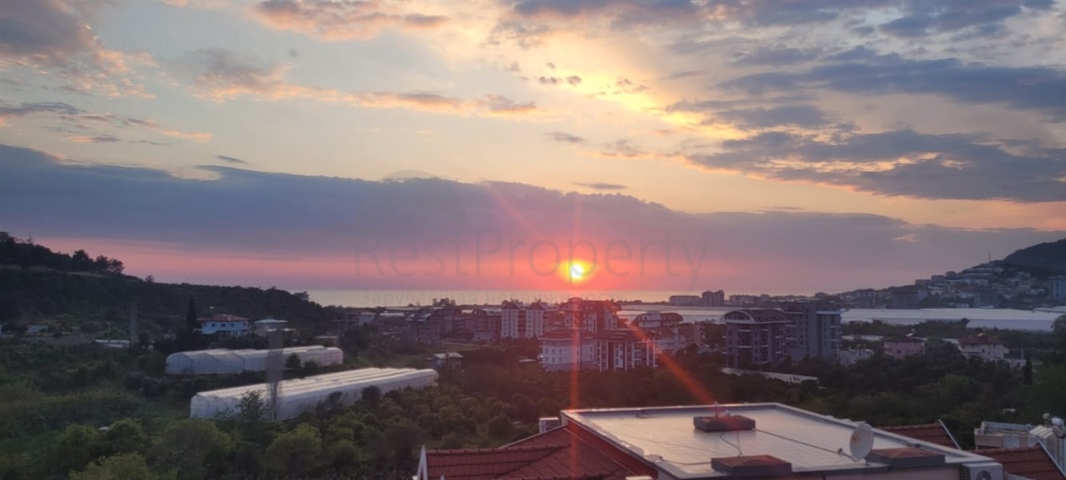 Просторная квартира 2+1 с видом на море в тихом районе Алании 