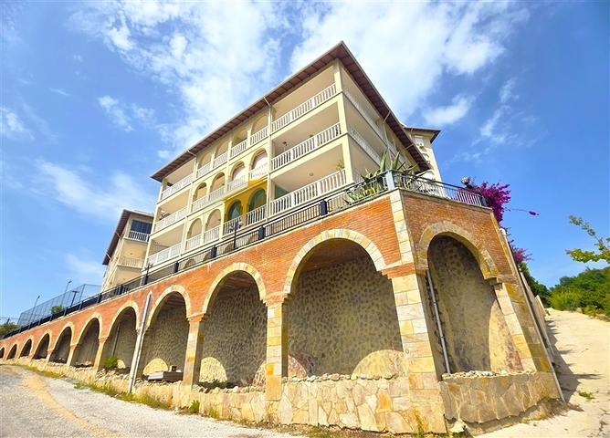 Просторная квартира 2+1 с видом на море в тихом районе Алании 