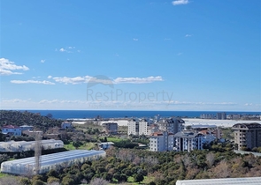 Просторная квартира 2+1 с видом на море в тихом районе Алании 