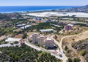 Просторная квартира 2+1 с видом на море в тихом районе Алании 