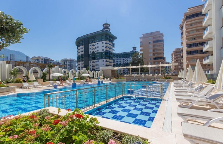 Современная квартира у моря в развитом районе Аланьи