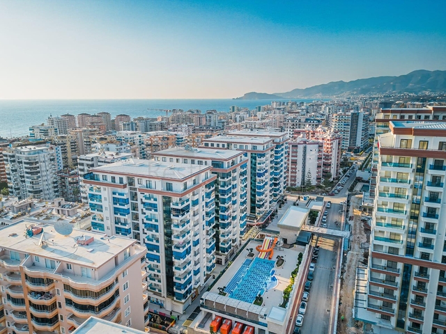 Современная квартира у моря в развитом районе Аланьи