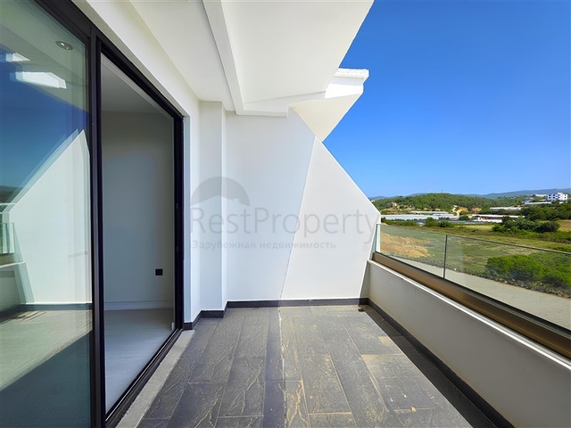 Роскошная квартира у моря с развитой инфраструктурой в Тюрклере