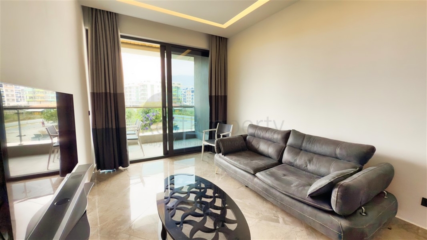 Квартира 1+1 у моря в живописном районе Каргыджак – идеальное предложение для жизни и отдыха