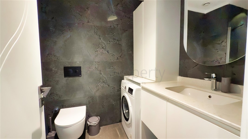 Квартира 1+1 у моря в живописном районе Каргыджак – идеальное предложение для жизни и отдыха