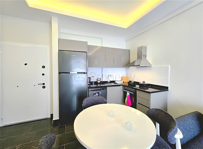 Современная квартира 1+1 в аренду — комфорт и инфраструктура в центре Махмутлара