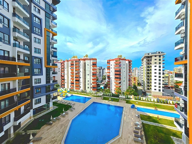 Современная квартира 1+1 в аренду — комфорт и инфраструктура в центре Махмутлара