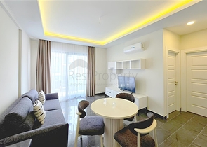 Современная квартира 1+1 в аренду — комфорт и инфраструктура в центре Махмутлара