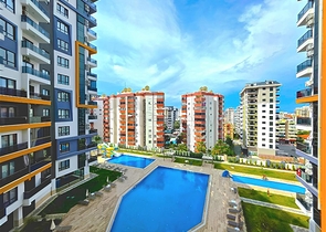 Современная квартира 1+1 в аренду — комфорт и инфраструктура в центре Махмутлара