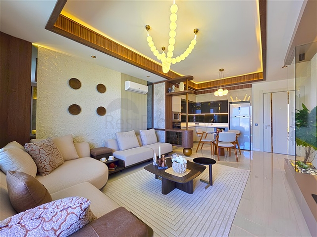 Современные апартаменты 1+1 в престижном комплексе у моря в Тюрклере