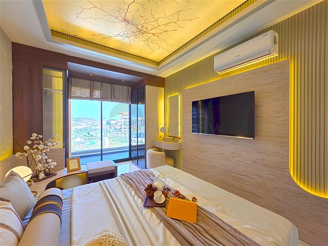 Современные апартаменты 1+1 в престижном комплексе у моря в Тюрклере