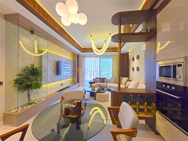 Современные апартаменты 1+1 в престижном комплексе у моря в Тюрклере