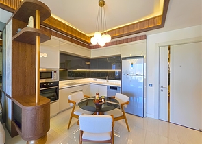 Современные апартаменты 1+1 в престижном комплексе у моря в Тюрклере