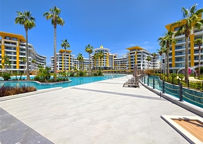 Современные апартаменты 1+1 в престижном комплексе у моря в Тюрклере