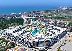 Современные апартаменты 1+1 в престижном комплексе у моря в Тюрклере