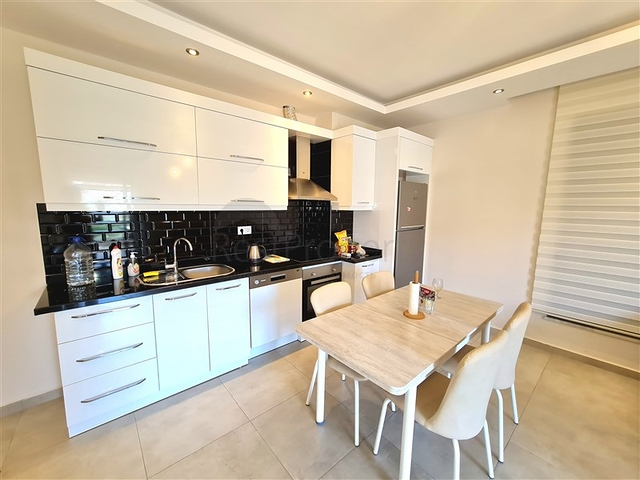 Современная меблированная квартира в жилом комплексе с богатой инфраструктурой в районе Оба