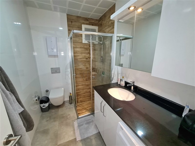 Современная меблированная квартира в жилом комплексе с богатой инфраструктурой в районе Оба