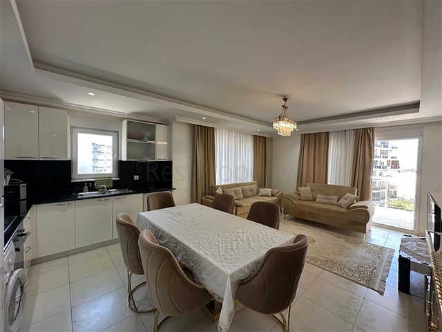 Просторная квартира с полной инфраструктурой в живописном районе Авсаллар