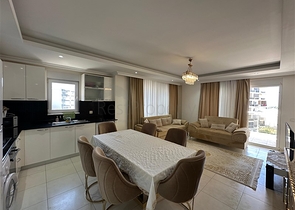 Просторная квартира с полной инфраструктурой в живописном районе Авсаллар