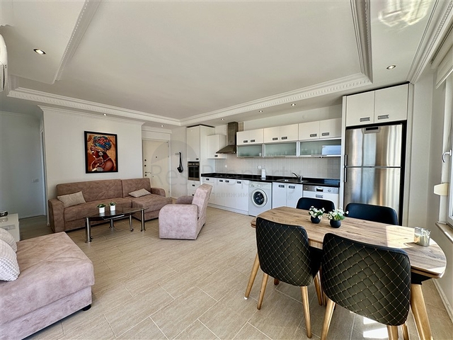 Уютная меблированная квартира 1+1 с панорамным видом в районе Джикджилли