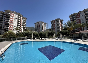 Уютная меблированная квартира 1+1 с панорамным видом в районе Джикджилли