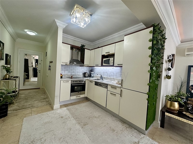 Уютная меблированная квартира 1+1 в престижном районе Джикджилли 