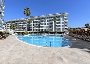 Просторная меблированная квартира 3+1 с богатой инфраструктурой в современном жилом комплексе