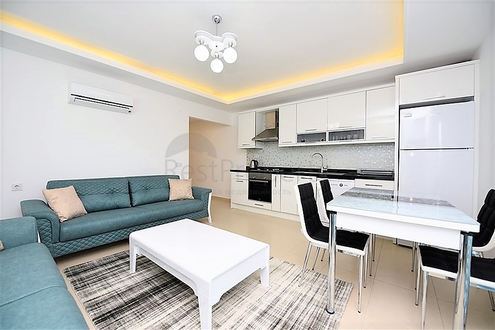 Уютная квартира 1+1 в жилом комплексе с богатой инфраструктурой в Авсалларе