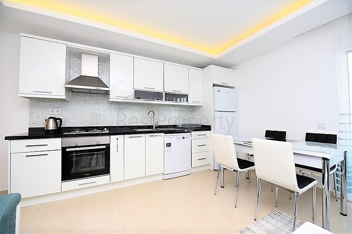 Уютная квартира 1+1 в жилом комплексе с богатой инфраструктурой в Авсалларе