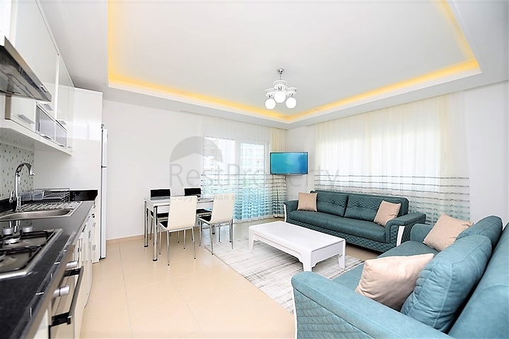 Уютная квартира 1+1 в жилом комплексе с богатой инфраструктурой в Авсалларе