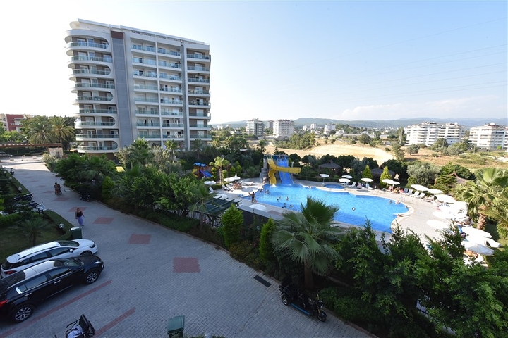 Уютная квартира 1+1 в жилом комплексе с богатой инфраструктурой в Авсалларе