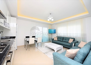 Уютная квартира 1+1 в жилом комплексе с богатой инфраструктурой в Авсалларе