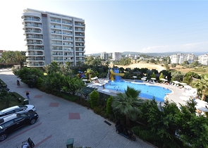 Уютная квартира 1+1 в жилом комплексе с богатой инфраструктурой в Авсалларе