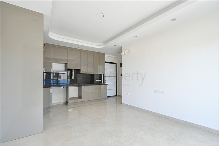 Стильная квартира с полной инфраструктурой в самом центре Махмутлара