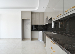 Стильная квартира с полной инфраструктурой в самом центре Махмутлара