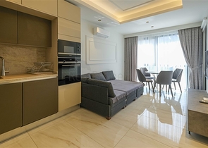 Современная квартира с панорамным видом на море в центре Махмутлара