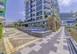 Современная квартира 1+1 с видом на море всего в 100 метрах от пляжа