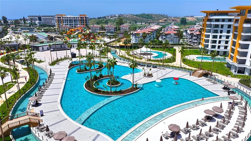 Роскошная квартира 3+1 с садом в элитном комплексе у моря