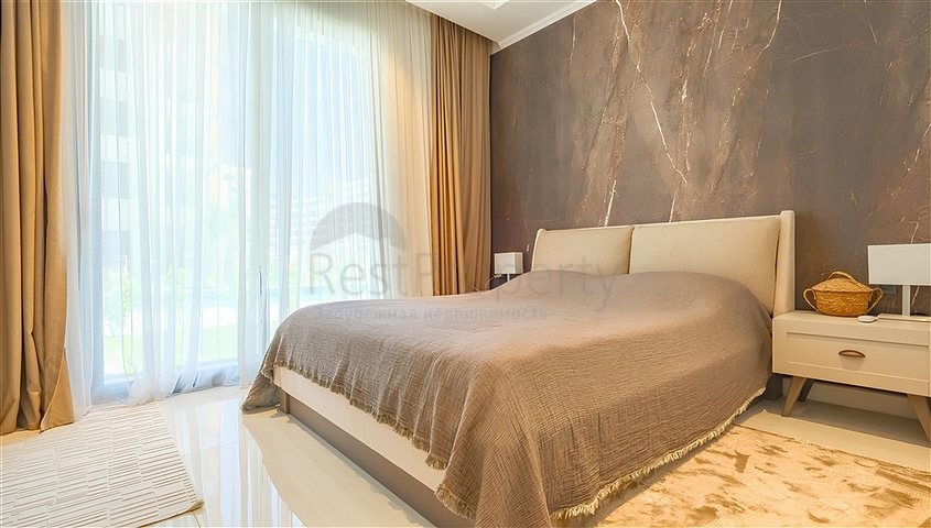 Роскошная квартира 3+1 с садом в элитном комплексе у моря