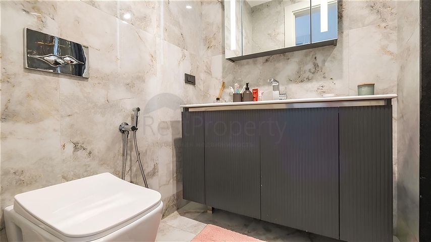 Роскошная квартира 3+1 с садом в элитном комплексе у моря