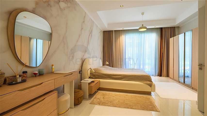 Роскошная квартира 3+1 с садом в элитном комплексе у моря