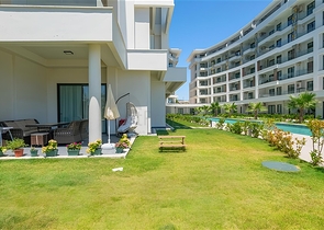 Роскошная квартира 3+1 с садом в элитном комплексе у моря