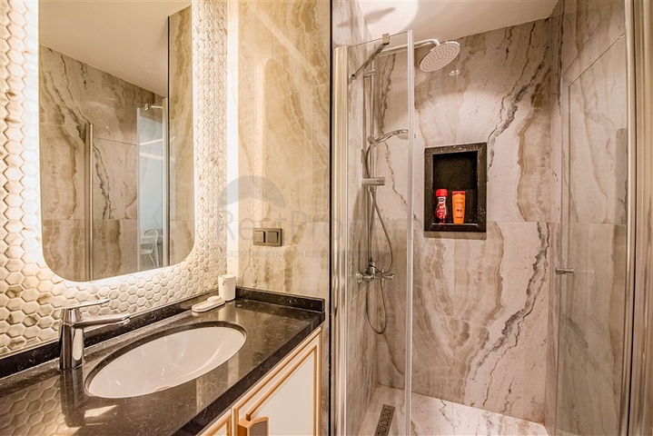 Современные апартаменты 1+1 в самом центре Аланьи с полной инфраструктурой