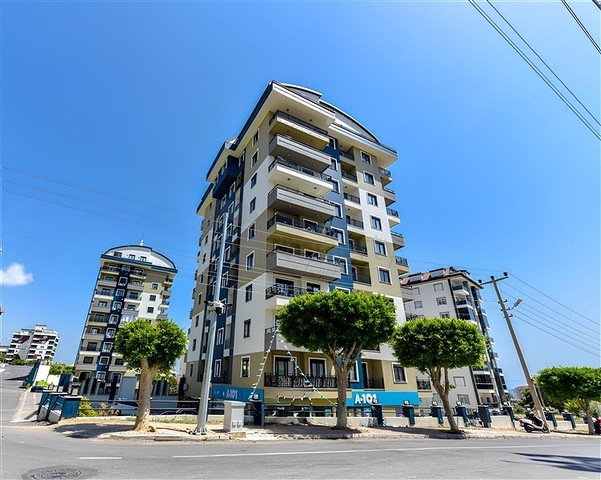 Просторный меблированный дуплекс с террасой и видом на море в современном жилом комплексе