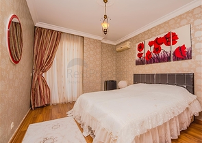 Просторная квартира 5+1 с панорамным видом и шаговой доступностью до моря в районе Тосмур