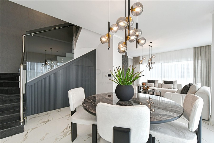 Современная вилла 3+1 с панорамным видом на море в районе Бекташ