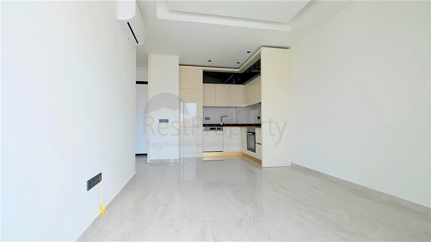 Современная квартира 1+1 в новом комплексе с видом на море в центре Аланьи