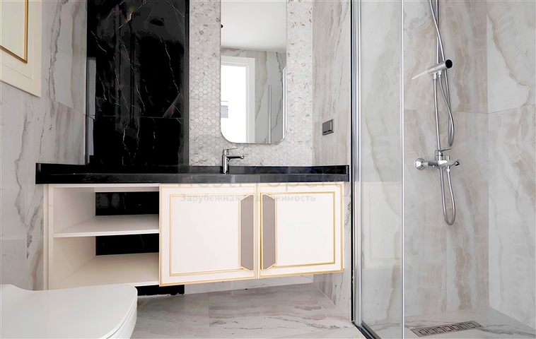 Современная квартира 1+1 в новом комплексе с видом на море в центре Аланьи